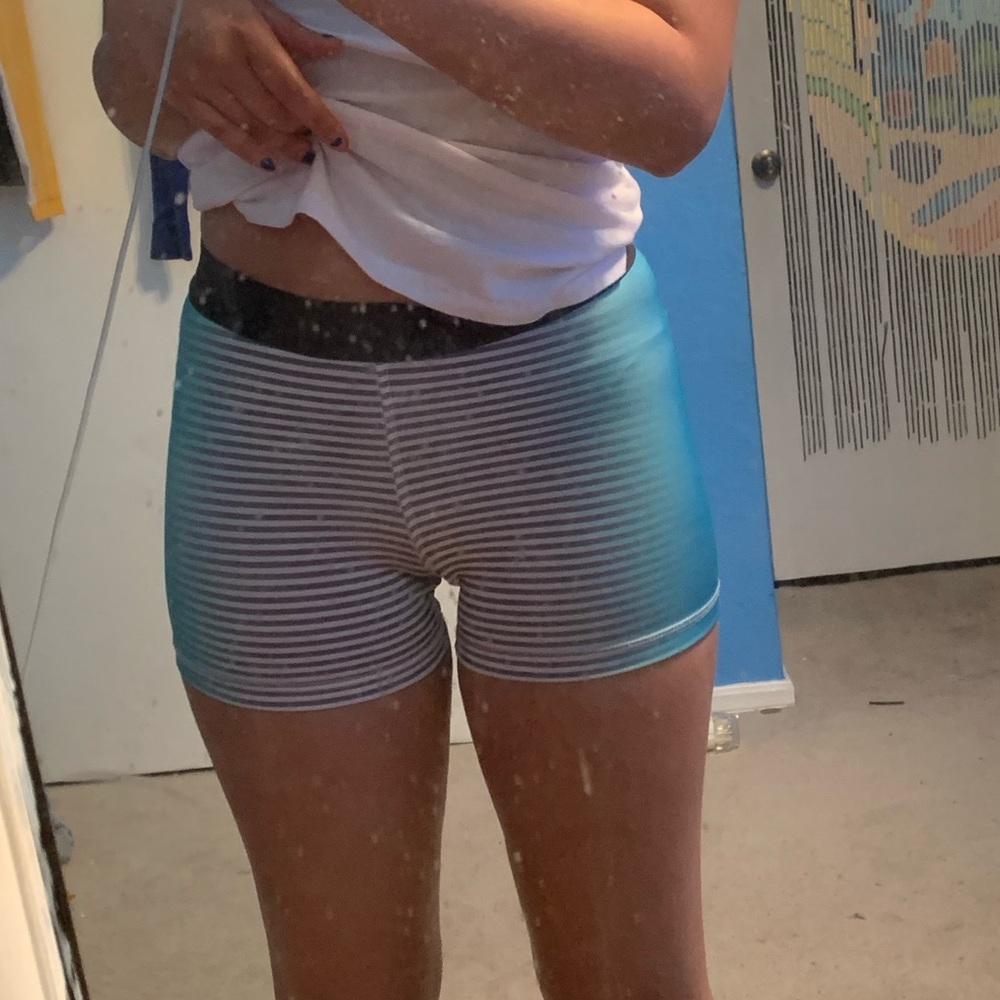 Blue & black tight fitting athletic shorts